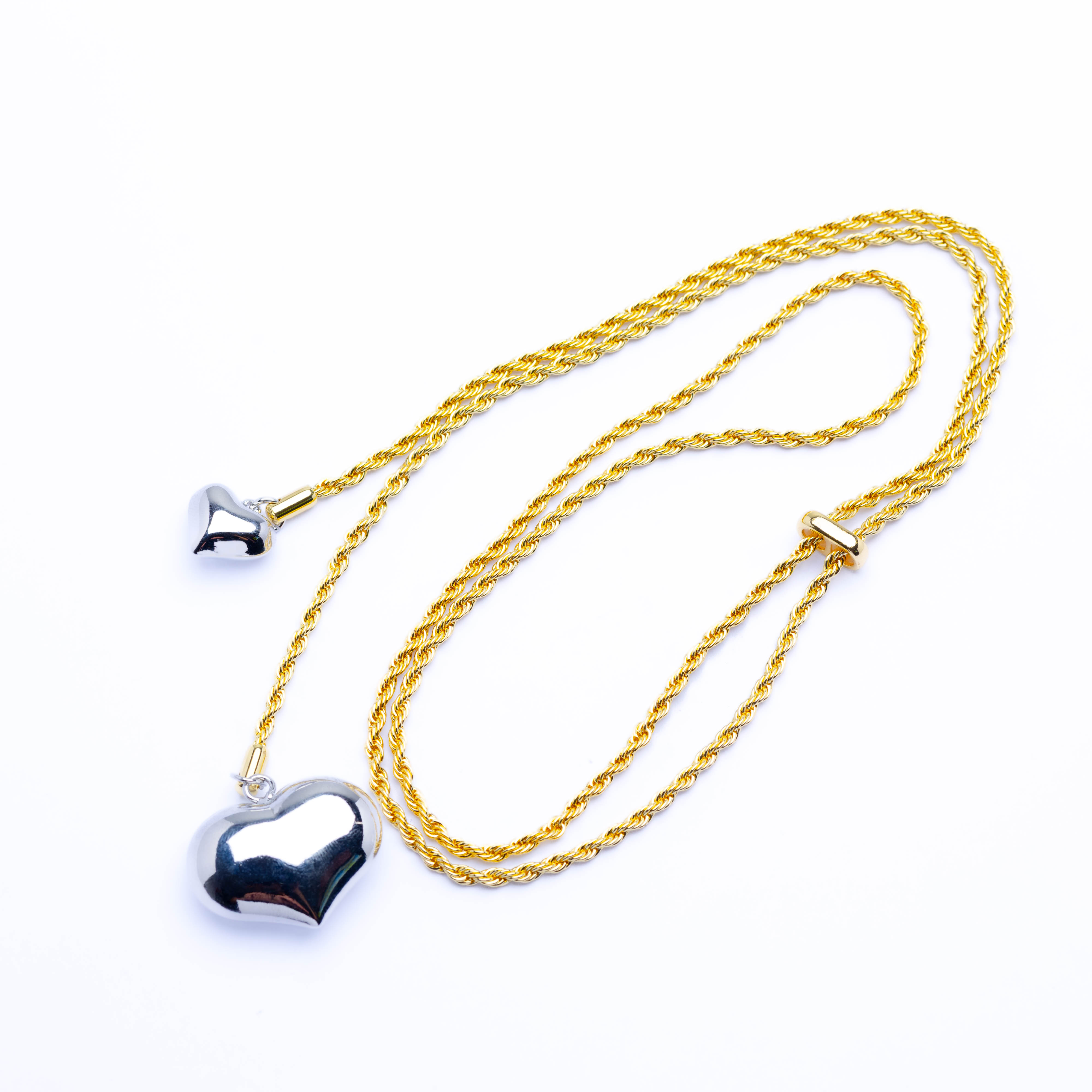 21216 Cadena Ajustable Rolo Dorada con Dos Corazones Plateados